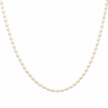Freshwater pearl necklace with 90 naturally shaped pearls and a 14k yellow gold clasp on a white background