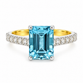18ct yellow gold and platinum ring featuring a 2.76ct emerald-cut aquamarine with 0.45ct diamond-set shoulders