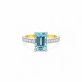 18ct yellow gold and platinum ring featuring a 2.76ct emerald-cut aquamarine with 0.45ct diamond-set shoulders