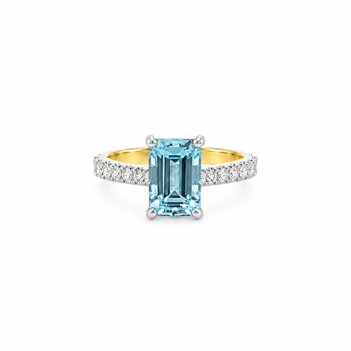 18ct yellow gold and platinum ring featuring a 2.76ct emerald-cut aquamarine with 0.45ct diamond-set shoulders