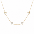 18k yellow gold necklace with four white flower-shaped motifs on a fine chain against a white background