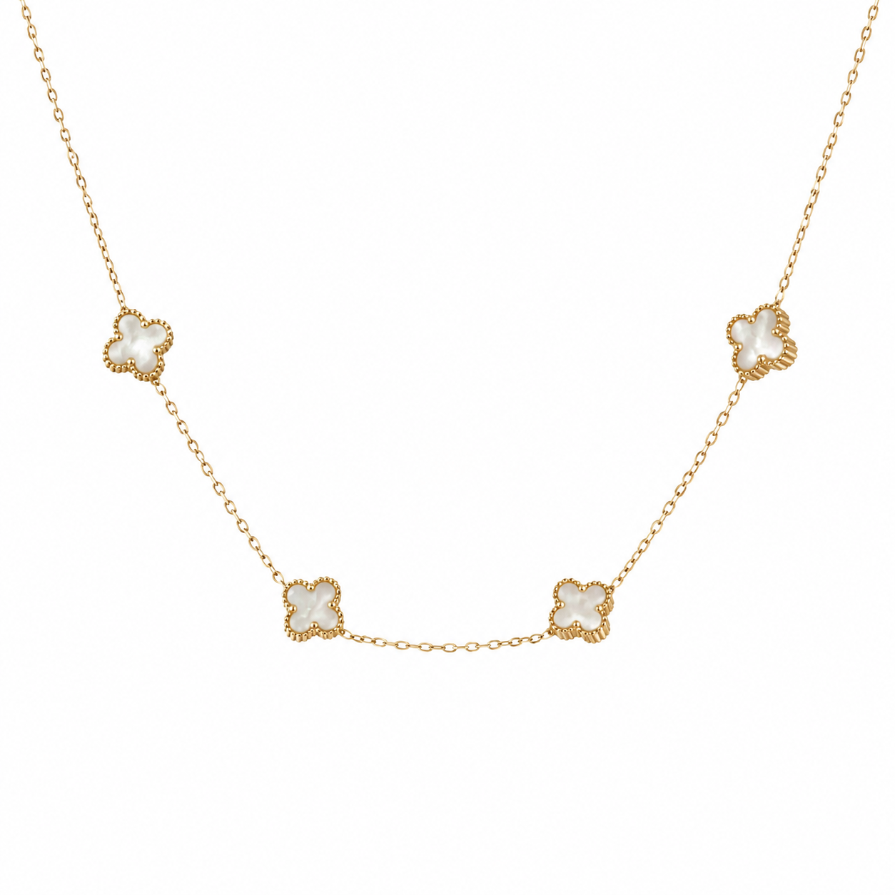 18k yellow gold necklace with four white flower-shaped motifs on a fine chain against a white background