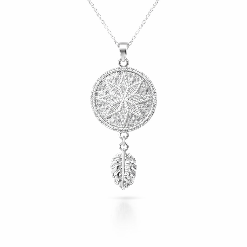 Woven Starburst Pendant In Silver With Leaf Tassel