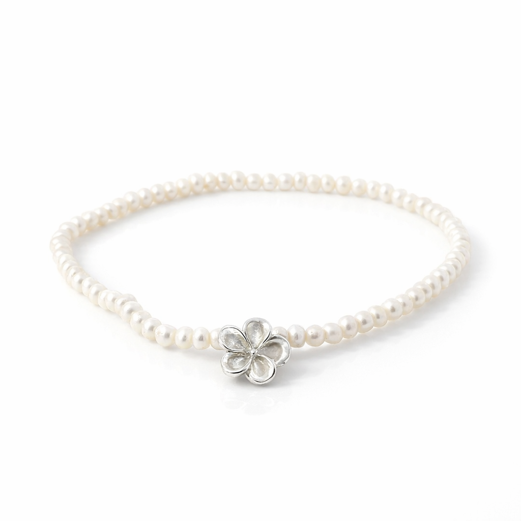 Petite Pearl Bracelet With Silver Flower Charm