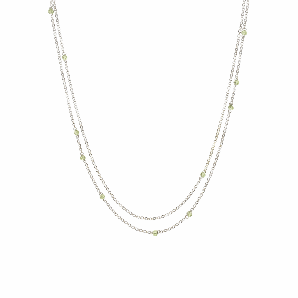 Necklace With Spaced Peridot Beads In Silver