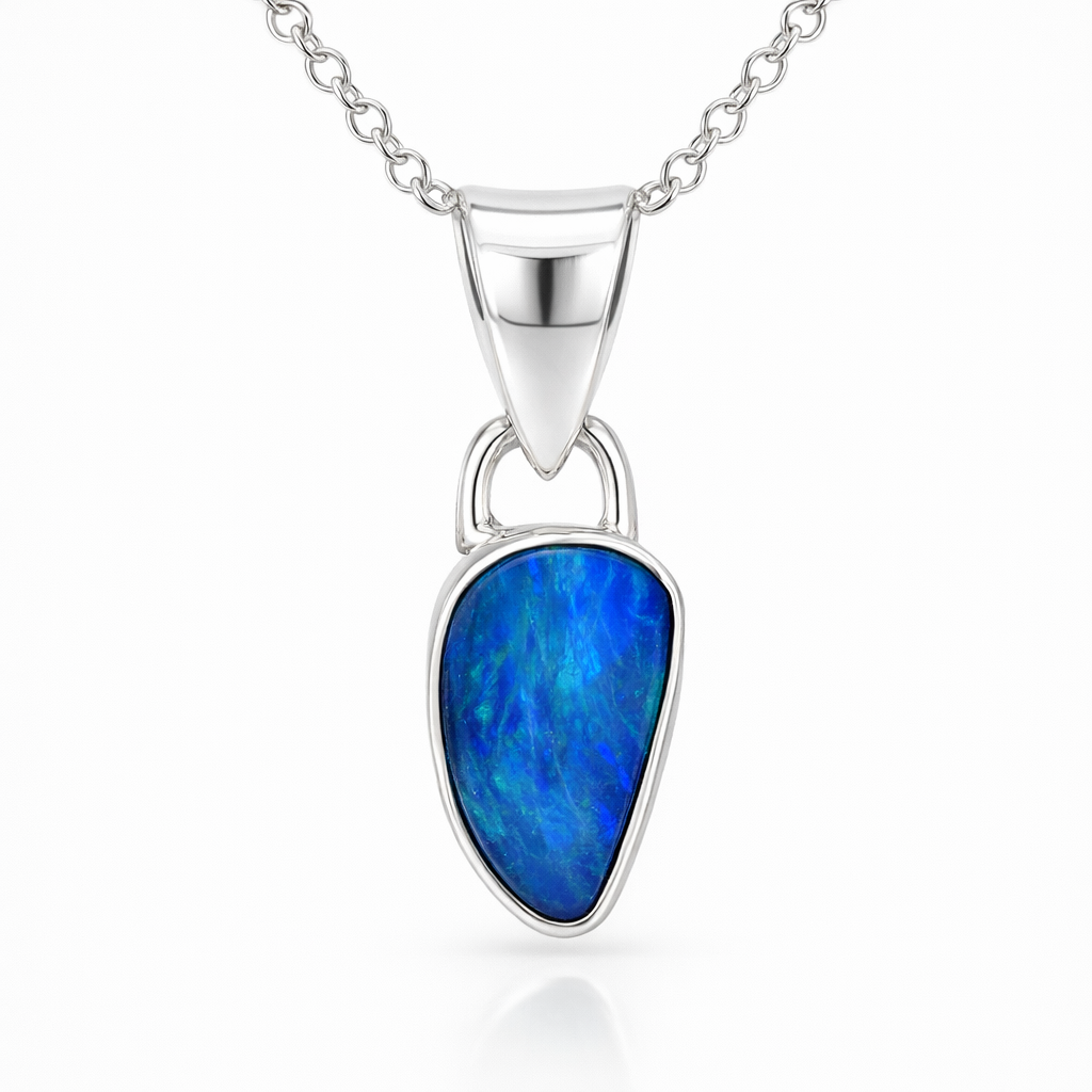 Vibrant Blue Opal Set In A Sterling Silver Pendant