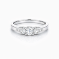 Round Brilliant And Baguette Cut Diamond Ring In 18K