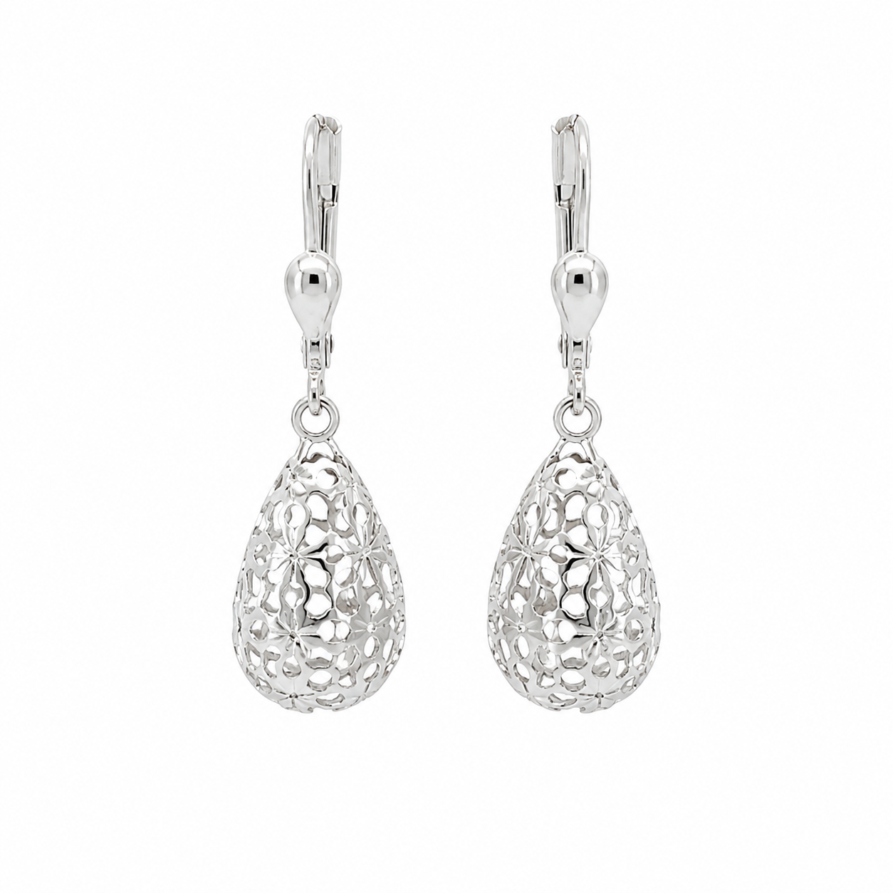 Pair pf 9k white gold filigree teardrop earrings with leverback closures on a white backround