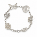 20cm sterling silver tropical charm bracelet with butterfly, palm leaf, monstera leaf and woven starburst charms