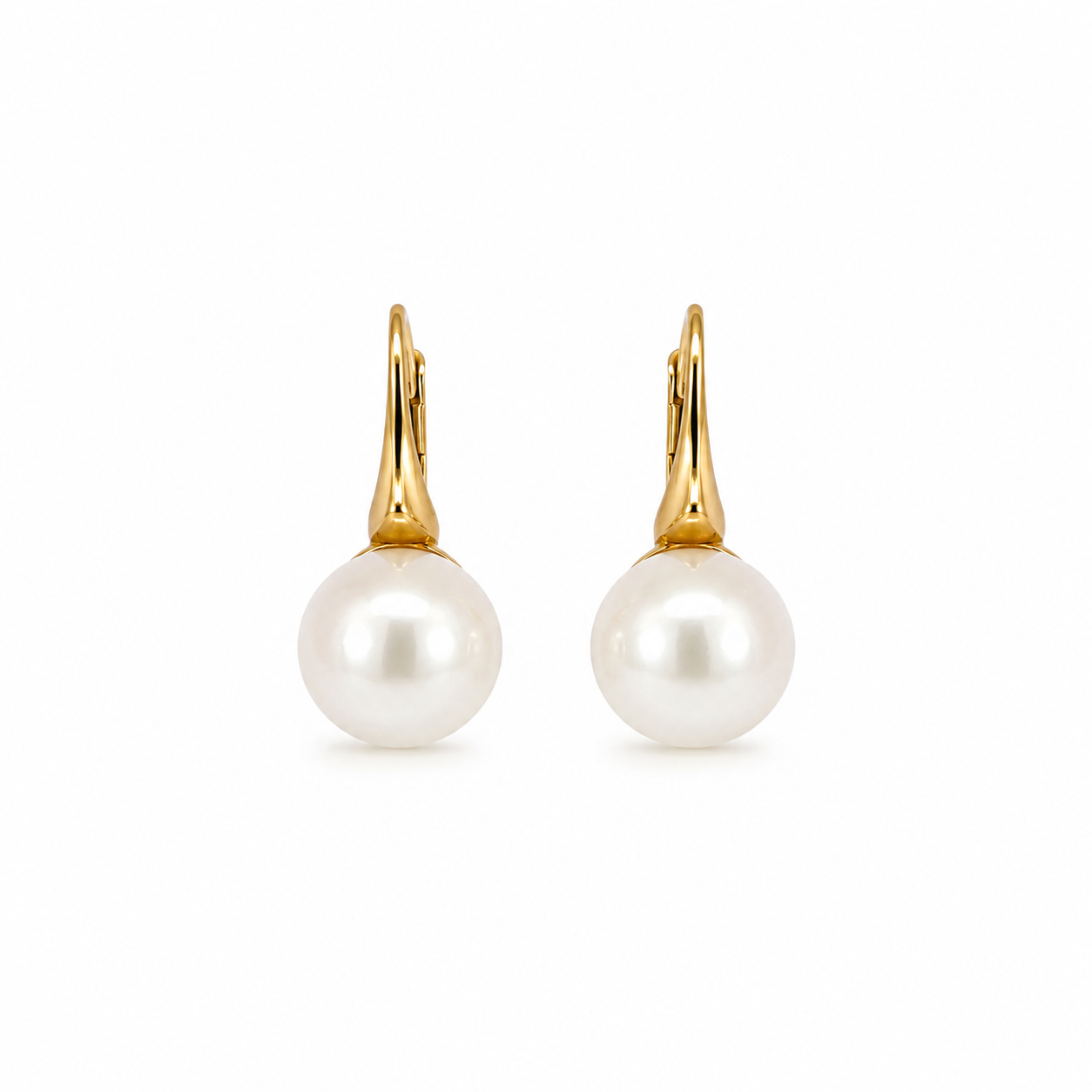 Pair of freshwater pearl earrings with gold-plated sterling silver leverback closures on a white background