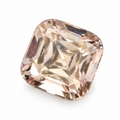 Faceted topaz gemstone with soft champagne and pale peach-pink tones, a cushion cut and natural inclusions.