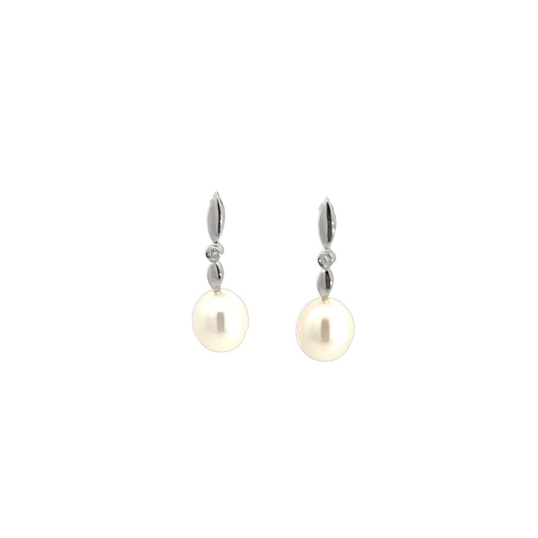 Pearl And Cubic Zirconia Earrings In Silver