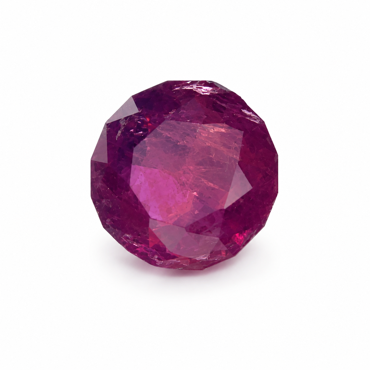 1.04ct faceted ruby gemstone with a rich deep red to pinkish-red colour and natural inclusions.