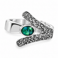 Sterling silver contemporary Australian opal ring featuring an oval green and blue opal in a bezel setting with a sculptural textured silver band