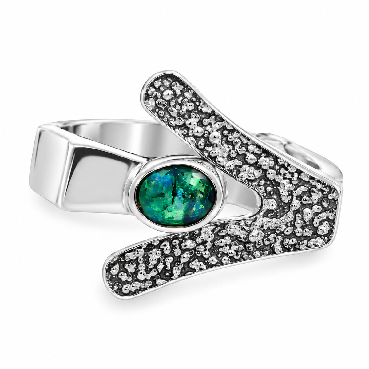 Sterling silver contemporary Australian opal ring featuring an oval green and blue opal in a bezel setting with a sculptural textured silver band