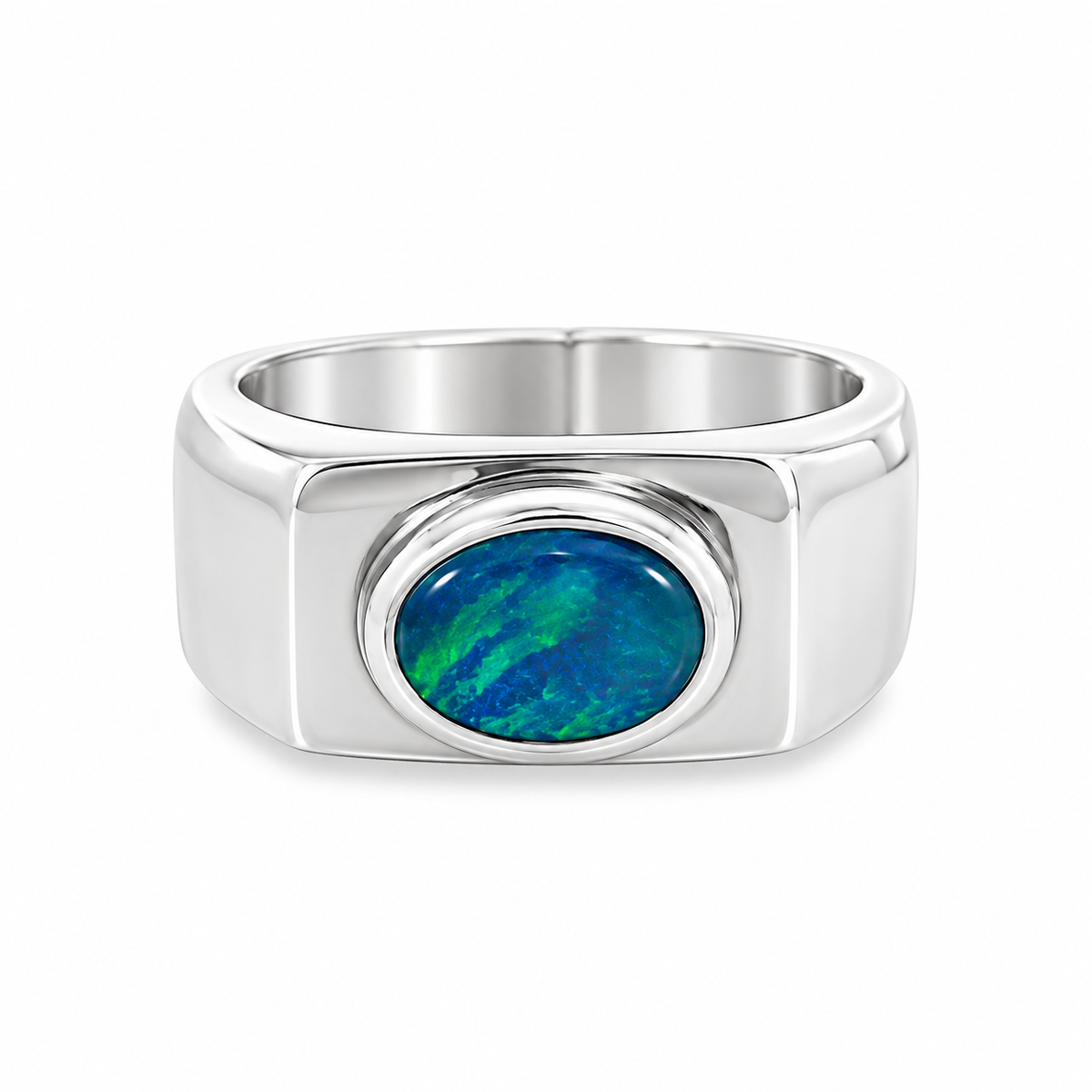 Sterling silver Australian opal wide-band ring featuring an oval blue and green opal in a polished bezel setting, Jules Collins Jewellery