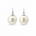 Pair of baroque freshwater pearl drop earrings with sterling silver hooks on a white background