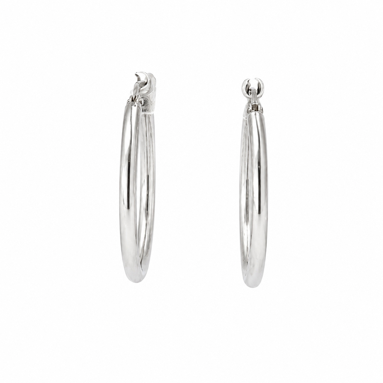 Pair of polished sterling silver hoop earrings measuring approximately 25 mm in outer diameter on a white background