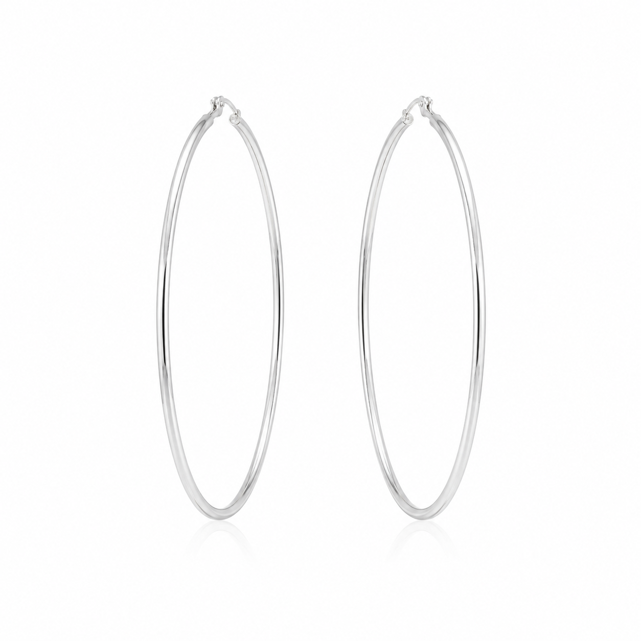 Pair of polished sterling silver hoop earrings measuring approximately 55 mm in diameter on a white background