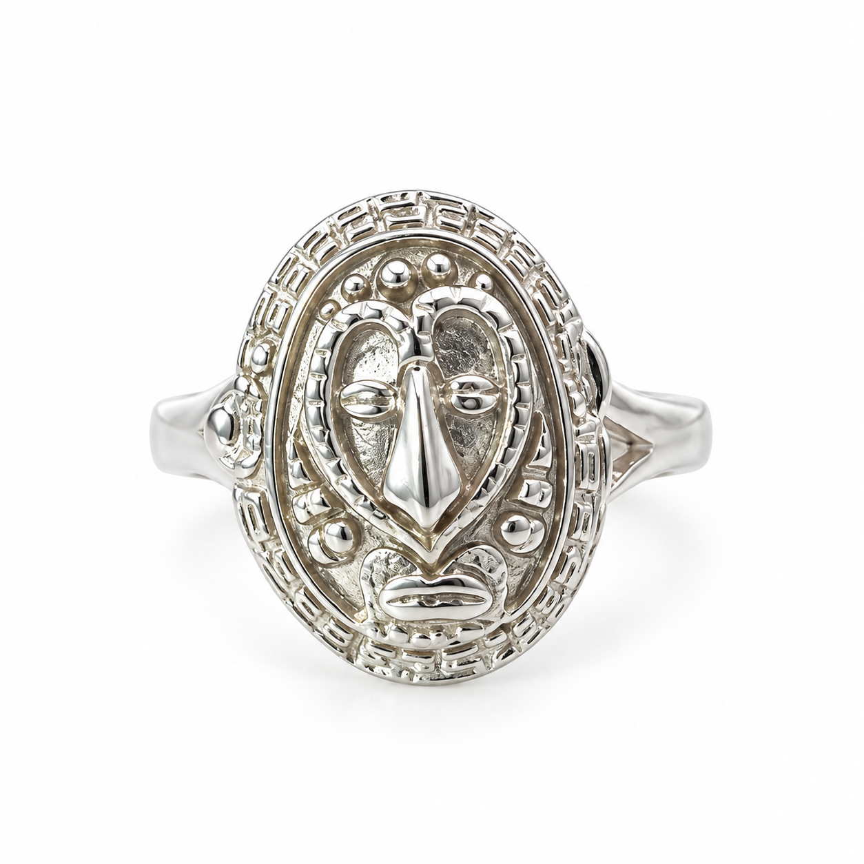 Sterling silver Papua New Guinea tribal mask ring with detailed oval mask design